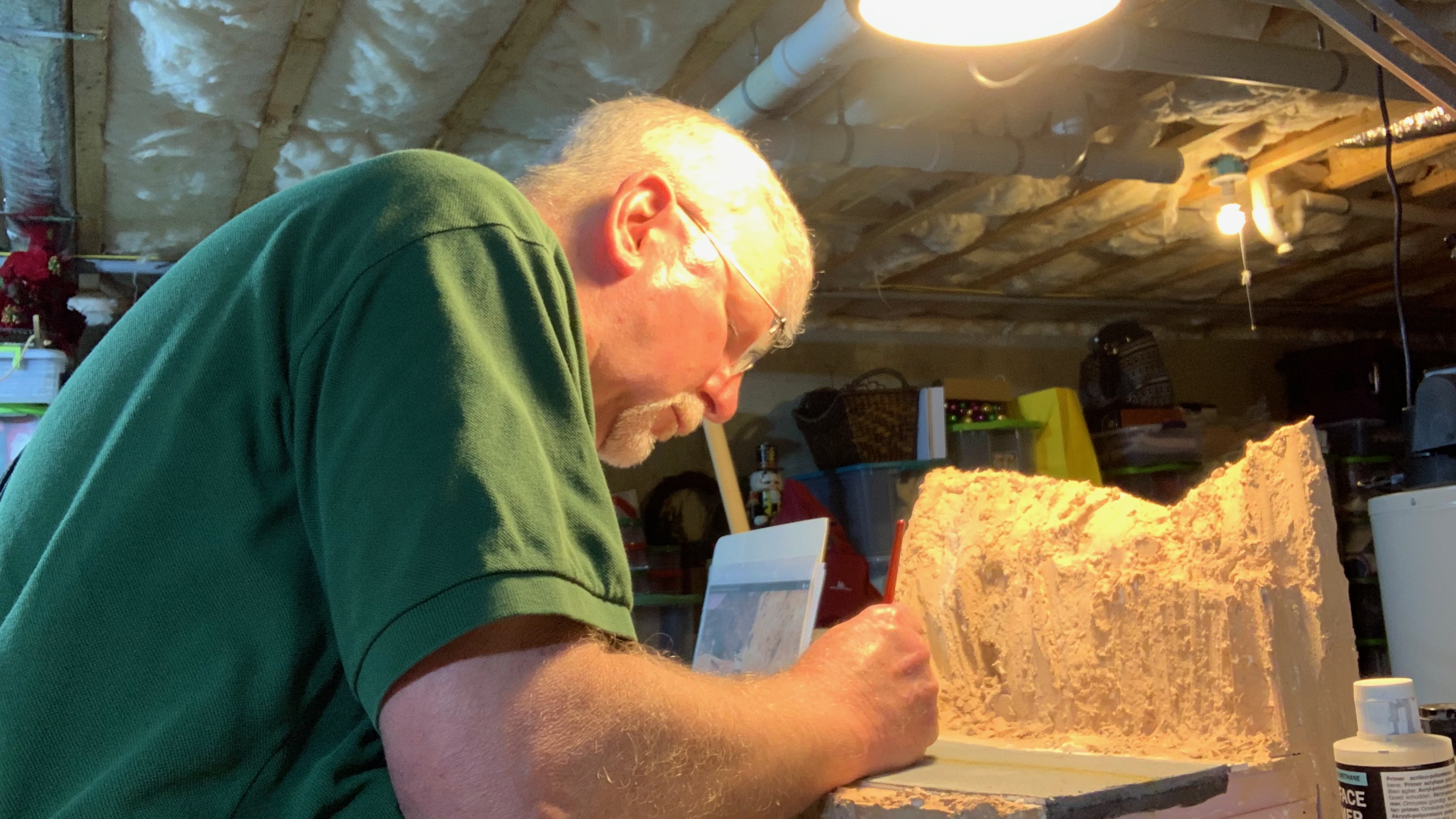 At the workbench bringing the scene together